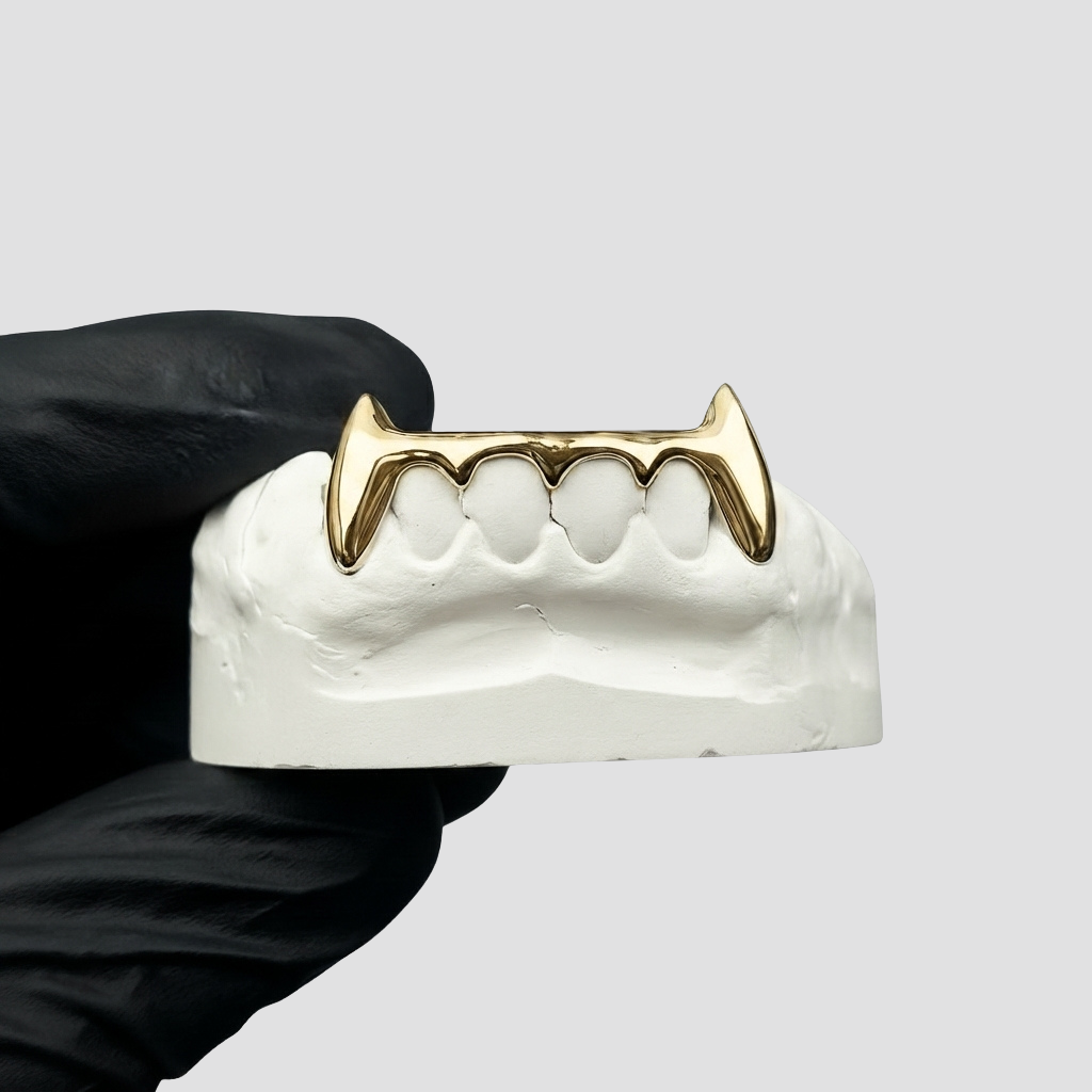 London bridge + vampire grillz